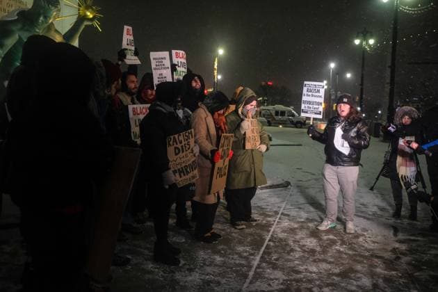 January 27, 2023, Detroit, Michigan, United States: A protester speaks to a crowd of protesters during a vigil for Tyre Nichols in solidarity with other protests being held around the country. Protests were held around the country following the release of body cam footage of the arrest and beating of Tyre Nichols in Memphis, Tennessee which led to his death and 5 officers involved being arrested and charged with murder. Detroit United States - ZUMAs197 20230127_zaa_s197_341 Copyright: xMatthewxHatcherx
