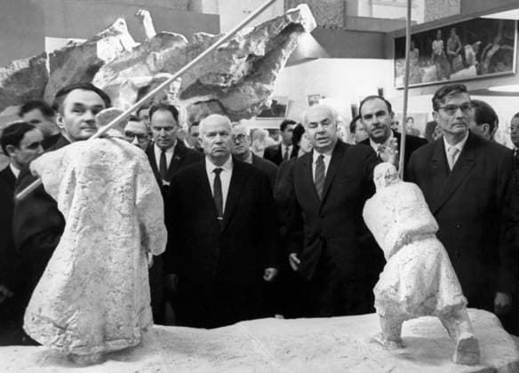 Moscow, USSR. December 1, 1962. Chief Editor of Pravda newspaper Pavel Satyukov, Soviet leader Nikita Khrushchev, President of the Academy of Arts of the USSR Vladimir Serov and member of the Communist Party of the Soviet Union Mikhail Suslov (L-R, 1st row) attend an exhibition of the New Reality avant-garde artist cooperative at the Moscow Manege. Vasily Yegorov TASS  1227013