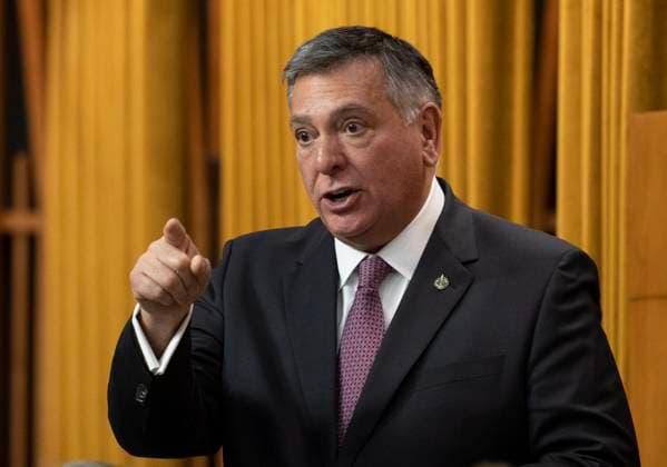 January 30, 2023, Ottawa, ON, Canada: Member of Parliament from Mississauga-Lakeshore Charles Sousa rises for the first time since taking his seat in the House of Commons during Question Period, Monday, January 30, 2023 in Ottawa. Ottawa Canada  - ZUMAc35_ 20230130_zaf_c35_097 Copyright: xAdrianxWyldx