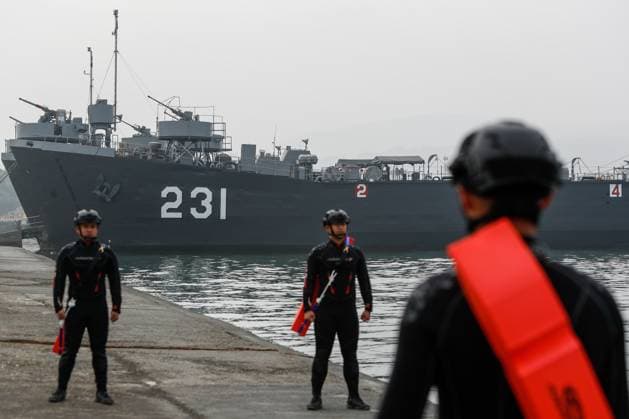 January 12, 2023, Kaohsiung, Kaohsiung, Taiwan: Navy officers stand guard near a military vessel during a military drill simulating defence operations against a possible Chinese PLA intrusion on Jan 12, 2023 in Kaohsiung. United States military officials and international political experts have recently warned that the possibility of a war between China and the United States has increased, amid rising tensions in the Taiwan Strait where Chinese PLA presence has strengthened. Kaohsiung Taiwan - ZUMAs313 20230112_zip_s313_005 Copyright: xDanielxCengxShou-Yix