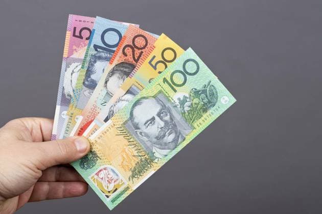  Australian money in the hand on a gray background, Australian money - dollars in the hand on a gray background, Australian money - dollars in the hand on a gray background, 13.01.2023, Copyright: xJohanx Panthermedia33468473.jpg