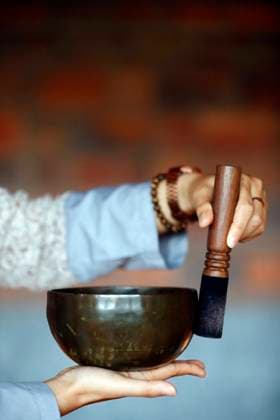 Bowl in the hands of prayer, Tibetan singing bowl, Buddhist instrument used in sound therapy, meditation and yoga, Quang Ninh, Vietnam, Indochina, Southeast Asia, Asia Copyright: Godong 809-8597