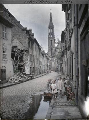 RECORD DATE NOT STATED Thann, Haut-Rhin, Alsace, France a street after the passage of an airplane , 1917 - Alsace - Paul Castelnau (photographic section of the armies) - (June) (French - ï»¿Thann , Haut-Rhin , Alsace , France Une rue au passage d un avion). Brand, child, plane, street scene, ruins, front, bombardment, street , neighborhood, Human beings, daily life, the First World War, Habitat , Architecture, France, Thann, a street (after an airplane) Copyright: xpiemagsx AKahnlpie020223-13533 !ACHTUNG AUFNAHMEDATUM GESCHÄTZT!