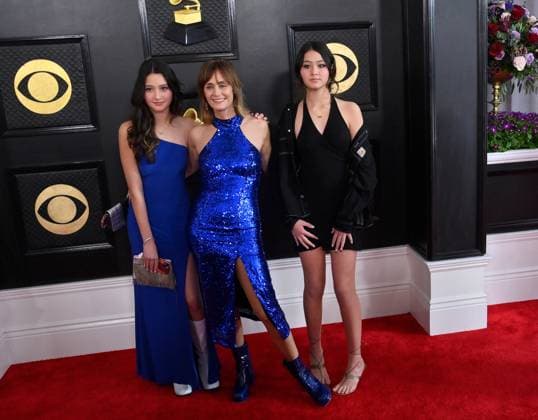 (L-R) Sawyer Chung, Diane Farr and Coco Chung attend the 65th annual Grammy Awards at the Crypto.com Arena in Los Angeles on Sunday, February 5, 2023.  LAP20230205725 JIMxRUYMEN