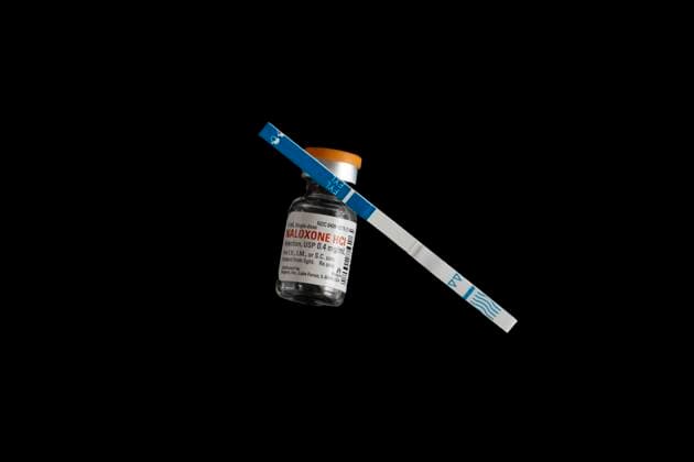 Fentanyl test strip with bottle of life saving Naloxone. Â¬ÂMichaelxSilukx xUniversalxImagesxGroup ms_1662.jpg 64393_48_ms_1662