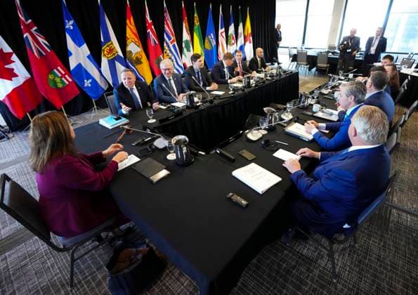 February 7, 2023, Ottawa, ON, Canada: Manitoba Premier Heather Stefanson, left, talks to Quebec Premier Francois Legault, back left, as she chairs a meeting with Canada s premiers in Ottawa on Tuesday, Feb. 7, 2023 in Ottawa. Ottawa Canada - ZUMAc35_ 20230207_zaf_c35_005 Copyright: xSeanxKilpatrickx