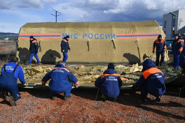 TURKEY, KAHRAMANMARAS PROVINCE - FEBRUARY 7, 2023: Russian rescue workers put up tents at the scene of an earthquake in Kahramanmaras Province in southeast Turkey. A major earthquake measuring 7.7 on the Richter scale struck southern Turkey and northwest Syria early on February 6; almost 150 subsequent aftershocks were felt across ten provinces of Turkey as well as the neighbouring countries, in particular Syria; according to recent reports more than 5,800 people died and over 34,000 were injured in Turkey. Maxim Grigoryev TASS  57243913