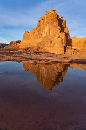 Creative Highlights World Entrada sandstone rock formation reflected in a rainwater pool in Arches National Park, Moab, Utah. This formation also forms the southwest wall of Park Avenue on the other side of the formation. Copyright: xJonxG.xFullerx xVWPicsx 6572-JGF-landscapes-Arches NP-US-UT