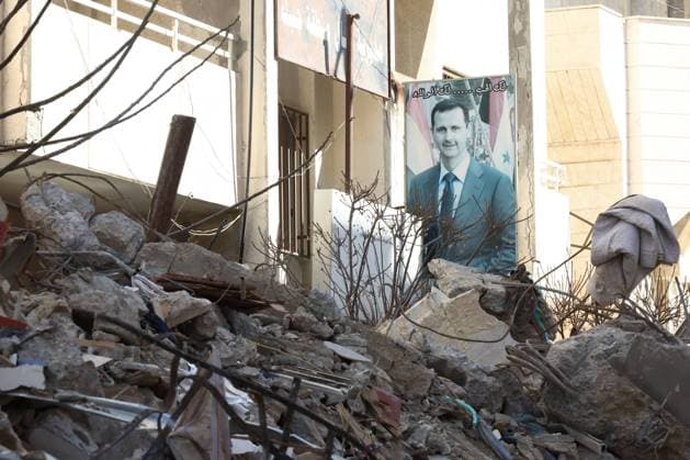 Bilder des Jahres 2023, News 02 Februar News Themen der Woche KW06 SYRIAN ARAB REPUBLIC, JABLEH - FEBRUARY 8, 2023: A poster with a portrait of Syrian president Bashar al-Assad is seen after an earthquake. A major earthquake measuring 7.7 on the Richter scale struck southern Turkey and northwest Syria early on February 6; almost 150 subsequent aftershocks were felt across ten provinces of Turkey as well as the neighbouring countries, in particular Syria; according to recent reports more than 1,500 people died and over 2,200 were injured in Syria. The Syrian provinces of Aleppo, Latakia, Tartus and Hama are the worst affected in the country. Valery Sharifulin TASS  57248431