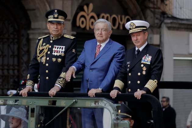 March Of Loyalty In Mexico Andres Manuel Lopez Obrador (blue suit), President of Mexico, during the March of Loyalty, which for the first time in more than a century, took place on Avenida Madero and the Zocalo in Mexico City, due to the greater participation of cadets on the occasion of the 200th anniversary of the Heroic Military College. He is accompanied by the Secretary of Defence, General Luis Cresencio Sandoval (left) and Admiral Rafael Ojeda Duran (right), Secretary of the Navy, among other officials. The March of Loyalty is named after the escort in a column of honour that the cadets of the Military College gave to President Francisco I. Madero to take him from Chapultepec Castle to the National Palace, in order to support the h  Copyright: xGerardoxVieyrax originalFilename: vieyra-notitle230209_npe0q.jpg
