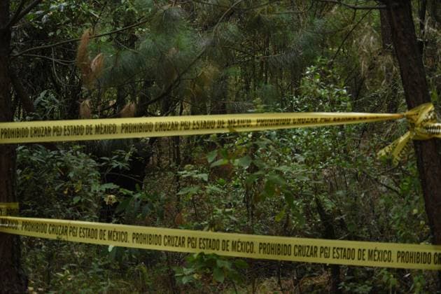 Clandestine grave found in forest in the State of Mexico with more than 60 bags of human remains, the second so far this year February 10, 2023 Lerma , Mexico : Aspects of the area where forensic experts from the State of Mexico conducted the proceedings where at least 9 clandestine graves were found in the forest on the border of the municipalities of Lerma and Ocoyoacac, unofficially have found a total of 68 packages with human remains, the area where these graves are still cordoned off to prevent the passage, where it is expected to continue working to locate more human remains. on February 10 , 2023 in Lerma, MÃ xico. (Photo by Arturo Hernandez Eyepix Group) Copyright: xArturoxHernandezx xEyepixxGroupx AH_100223_06