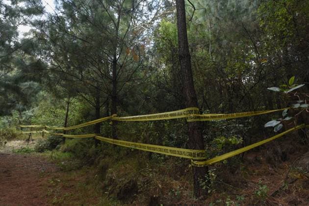 February 10, 2023 Lerma , Mexico : Aspects of the area where forensic experts from the State of Mexico conducted the proceedings where at least 9 clandestine graves were found in the forest on the border of the municipalities of Lerma and Ocoyoacac, unofficially have found a total of 68 packages with human remains, the area where these graves are still cordoned off to prevent the passage, where it is expected to continue working to locate more human remains. on February 10 , 2023 in Lerma, Mo xico. Lerma Mexico - ZUMAe321 20230211_zia_e321_005 Copyright: xArturoxHernandezx