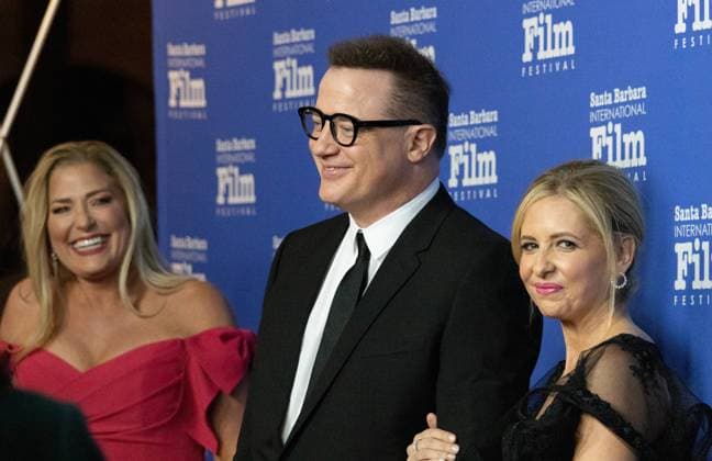 February 14, 2023, Santa Barbara, California, U.S: Brendan Fraser, star of The Whale, and his girlfriend Jeanne Moore on the left, Sarah Michelle Geller on the right, shines on the Red Carpet at the historic Arlington Theater on Valentineâ€⠢s Day, 2023, where Fraser is receiving the Santa Barbara International Film Festivalâ€⠢s prestigious American Riviera Award. Santa Barbara U.S. - ZUMAk144 20230214_znp_k144_016 Copyright: xAmyxKatzx