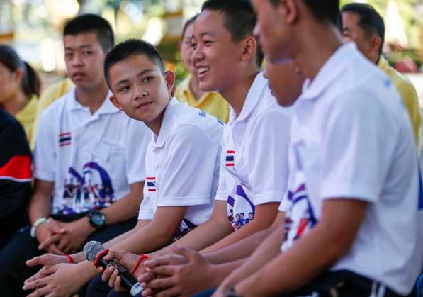 September 16, 2018, Chiang Rai, Thailand: Duangpetch Promthep (Dom) (2L) Captain of Wild Boar youth soccer team 1 of the 13 Wild Boars rescued from Tham Luang Cave seen during a press interview at Wat Phra That Doi Wao temple Chiang Rai. Chiang Rai Thailand - ZUMAs197 20180916_zab_s197_168 Copyright: xPongmanatxTasirix