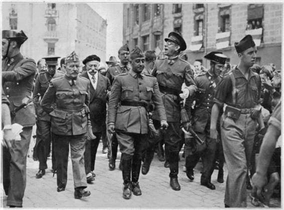 FRANCO AT BURGOS 1936 General Franco walks through the streets of Burgos, with Generals Cavalcanti and Mola, and numerous soldiers of the Nationalist forces Date: 1936  Copyright: Copyrightx(c)Geminix2023.xCredit:xGemini 13841858
