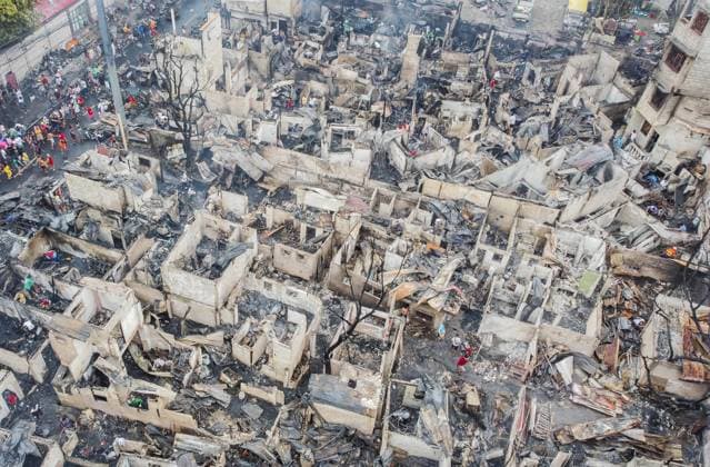 Bilder des Jahres 2023, News 02 Februar News Themen der Woche KW07 News Bilder des Tages (230219) -- QUEZON CITY, Feb. 19, 2023 -- This aerial photo taken on Feb. 19, 2023 shows the charred houses after a fire at a residential area in Quezon City, the Philippines. The fire that broke out Saturday night leaves about 500 families homeless and three people injured, according to the Philippine Bureau of Fire Protection (BFP). ) PHILIPPINES-QUEZON-FIRE-AFTERMATH RouellexUmali 