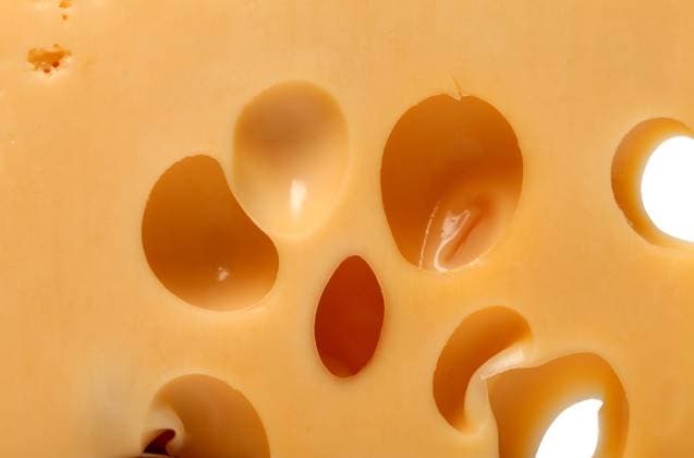Slice of cheese close-up view Copyright: xGannaxPoltoratskax xDesignxPicsx , 31928254 Copyright: stelianxporojnicux xDesignxPics 31928254