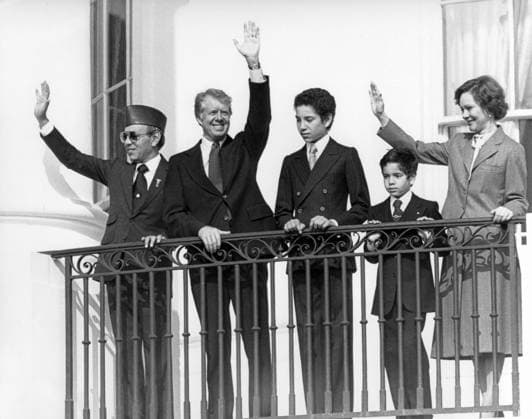 November 14, 1978, Washington, District of Columbia, USA: United States President Jimmy Carter, second left, and King Hassan II of Morocco, left, accompanied by first lady Rosalynn Carter, right, and the KingÃ¢â‚¬â ¢s two sons wave from the Blue Room Balcony following the State Arrival Ceremony on the South Lawn of the White House in Washington, DC on November 14, 1978 Washington USA - ZUMAs152 19781114_zaa_s152_001 Copyright: xBenjaminxE.x Gene xFortex