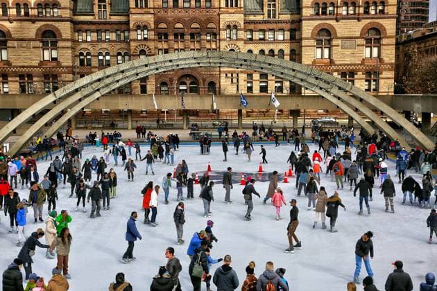 Winter In Toronto, Canada People enjoy ice skating at an outdoor ice rink in Nathan Phillips Square in downtown Toronto, Ontario, Canada, on February 19, 2023. Toronto Ontario Canada  Copyright: xCreativexTouchxImagingxLtdx originalFilename: friedman-winterin230219_npVEJ.jpg