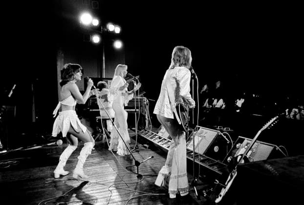 Swedish pop group Abba with from left Anni-Frid Lyngstad, Agnetha Faltskog and Bjorn Ulvaeus performs on stage during a concert at Gamleby Folkpark in Vastervik, Sweden, July 9, 1975, during Abba Folkpark Tour 1975. Vastervik Sweden x3019x *** Swedish pop group Abba with from left Anni Frid Lyngstad, Agnetha Faltskog and Bjorn Ulvaeus performs on stage during a concert at Gamleby Folkpark in Vastervik, Sweden, July 9, 1975, during Abba Folkpark Tour 1975 Vastervik Sweden x3019x  Copyright: xChristerxKindahl KB TTx ABBA FOLKPARK TOUR 1975