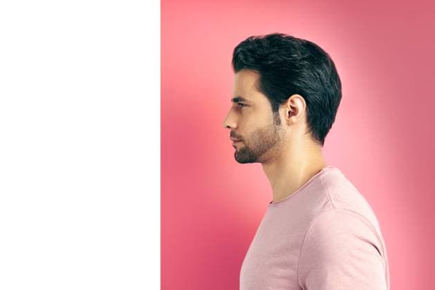 Close up profile view portrait of handsome man on geometric background Close up profile view portrait of handsome man on geometric pink white background Copyright: xZoonar.com ViktorxGladkovx 15909787 ,model released, Symbolfoto ,property released