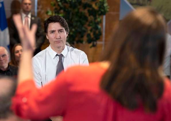 February 22, 2023, Longueuil, PQ, Canada: Prime Minister Justin Trudeau listens to a question as he takes part in a town hall meeting with Quebec agricultural producers in Longueuil, Que., Wednesday, Feb. 22, 2023. Longueuil Canada  - ZUMAc35_ 20230222_zaf_c35_116 Copyright: xRyanxRemiorzx