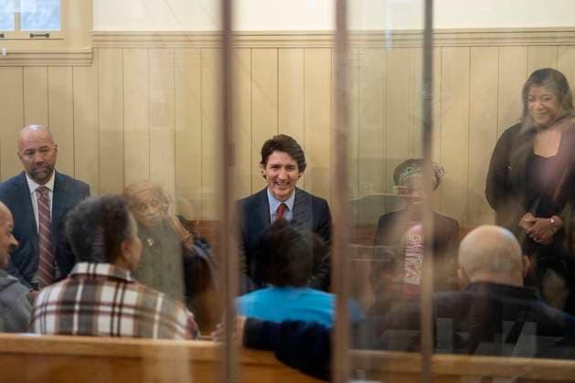 February 23, 2023, Halifax, NS, Canada: Prime Minister Justin Trudeau, centre, shares a laugh with community members at the Africville museum in Halifax on Thursday, February 23, 2023. Halifax Canada  - ZUMAc35_ 20230223_zaf_c35_056 Copyright: xDarrenxCalabresex