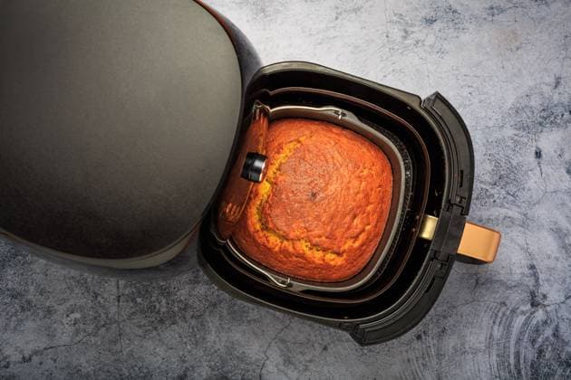 Cooking and baking in airfryer - homemade pumpkin apple cake Cooking and baking in airfryer - homemade pumpkin apple cake Copyright: xZoonar.com IngridxBalabanovax 19348466