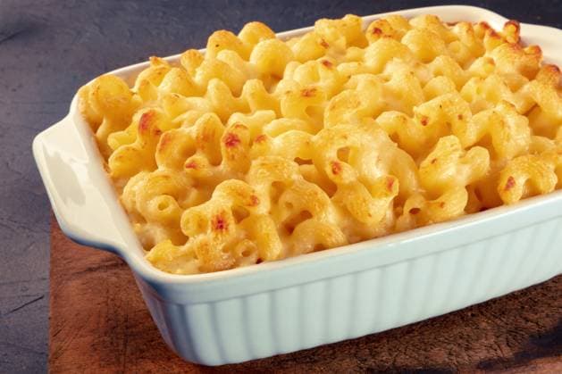 Macaroni and cheese pasta in a casserole, cheesy American dish, baked Macaroni and cheese pasta in a casserole, cheesy American dish, baked in the oven Copyright: xZoonar.com KaterinaxSolovyevax 19348012