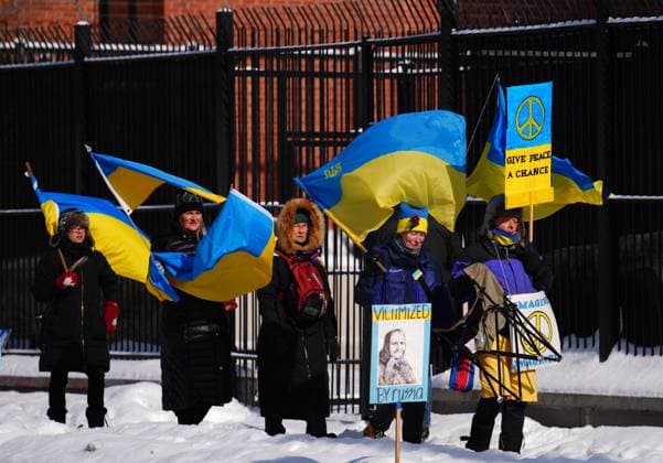 February 24, 2023, Ottawa, Ontario, Canada: People demonstrate against the war in the Ukraine in front of the Russian embassy in Ottawa on Friday, Feb. 24, 2023. Ottawa Canada  - ZUMAc35_ 20230224_zaf_c35_019 Copyright: xSeanxKilpatrickx