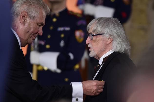 FILE - In the file photo, Slovak director Juraj Jakubisko receives from Czech President Milos Zeman the Medals of Merit for contribution to the state in the field of art in Prague, Czech Republic, October 28, 2016. One of the leading film-makers of the Czechoslovak New Film Wave of the 1960s, died in Prague, where he lived, on Friday, Feb. 24, 2023. He was 84. (CTKxPhoto RomanxVondrous) CTKPhotoP201610281047301  CTKPhotoP201610281047301