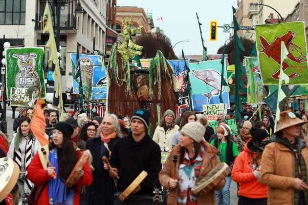 February 25, 2023, VICTORIA, BC, CAN: People march during a rally against the destruction of old growth forests towards the front lawn of the legislature in Victoria, B.C., on Saturday, February 25, 2023. VICTORIA CAN  - ZUMAc35_ 20230225_zaf_c35_026 Copyright: xChadxHipolitox