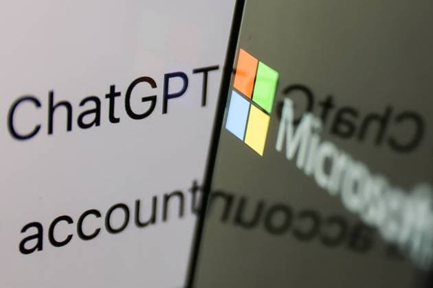 Microsoft Bing And OpenAI ChatGPT Photo Illustrations ChatGPT website displayed on a laptop screen and Microsoft logo displayed on a phone screen are seen in this illustration photo taken in Krakow, Poland on February 26, 2023. Krakow Poland  Copyright: xJakubxPorzyckix originalFilename: porzycki-microsof230226_np6bN.jpg