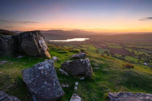 Sunset view towards Llangorse Lake in the Brecon Beacons from Cockit Hill. Copyright: xLoopxImages MarkxBauerx MBR03822035