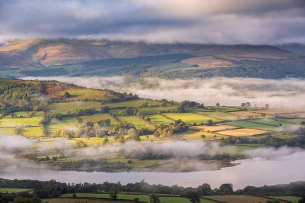 View over Llangorse Lake from Cockit Hill in the Brecon Beacons on a misty morning. Copyright: xLoopxImages MarkxBauerx MBR03822037