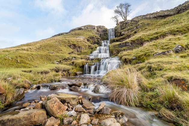 The movement of the water flowing down a beautiful waterfall at Cray in the Yorkshire Dales. Copyright: xLoopxImages JasonxWellsx JWS00623WT255
