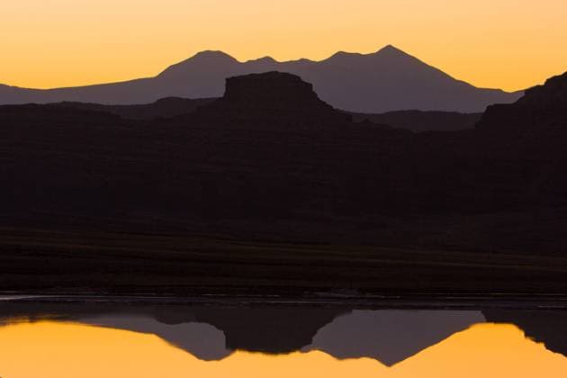 Sandstone butte & La Sal Mountains reflected on the surface of an evaporation pond at a potash solution mine near Moab, Utah. Moab Utah United States Copyright: xJonxG.xFullerx xVWPicsx 3437-JGF-mining-potash mine-US-UT