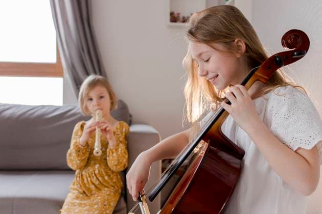 Happy girls playing musical instruments at home model released, Symbolfoto property released, VIVF00358