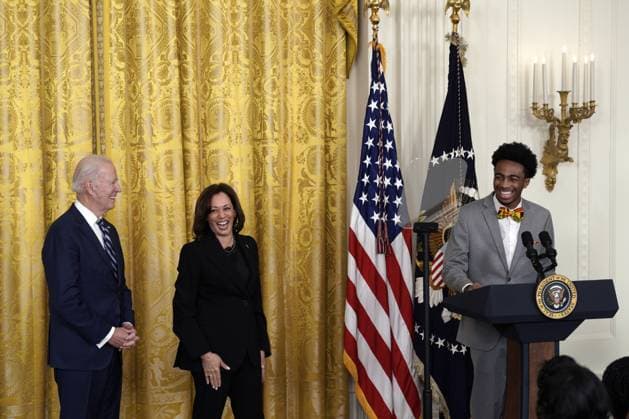 U.S. President Joe Biden and Vice President Kamala Harris react as DuWayne Portis Jr., a high school student from Chicago, speaks at a reception celebrating Black History Month at the White House in Washington DC on Monday, February 27, 2023.  WAX20230227256 YurixGripas