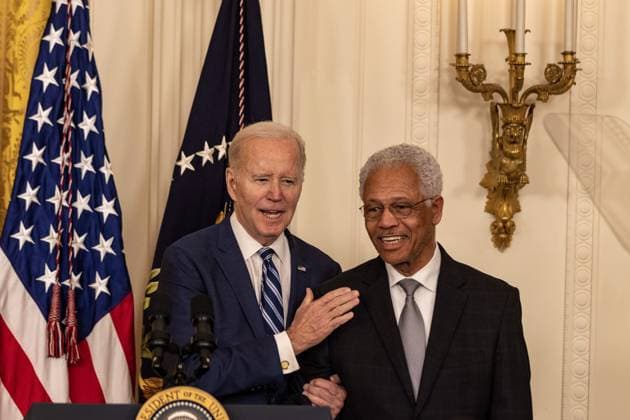 President Joe Biden greets Norman Griffiths after he delivers remarks at reception celebrating Black History month in the East Room of the White House in Washington, D.C. on Monday, February 27, 2023.  WAP2023027011 TASOSxKATOPODIS