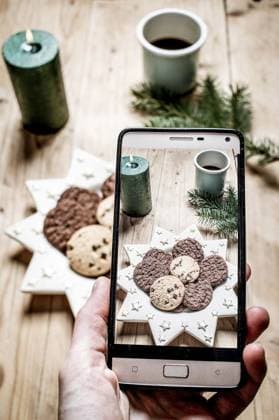 RECORD DATE NOT STATED top view of beige and green Christmas decorations cozy home hygge