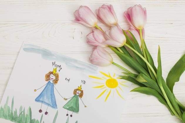 RECORD DATE NOT STATED kid drawing mother daughter with flower. Resolution and high quality beautiful photo. kid drawing mother daughter with flower. High quality and resolution beautiful photo concept