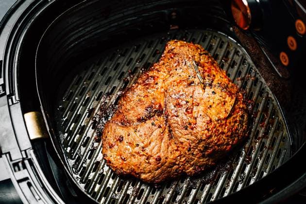 Grilled flank beef steak with rosemary Grilled flank beef steak with rosemary, prepared in airfryer Copyright: xZoonar.com IngridxBalabanovax 19595640