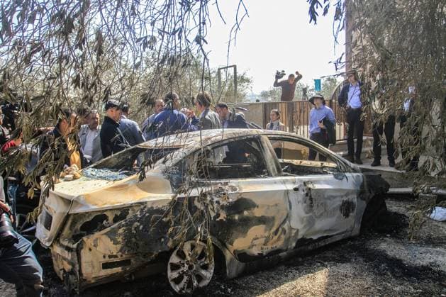 March 3, 2023, Nablus, West Bank, Palestine: Sven Kuhn von Burgsdorff, the European Union representative for the Palestinian Territories, center, survey the damage of a burnt car in the West Bank town of Hawara which was set ablaze by radical Jewish settlers earlier this week . On Monday scores of Israeli settlers went on a violent rampage in the northern West Bank town of Hawara, setting cars and homes on fire after two settlers were killed by a Palestinian gunman. Nablus Palestine - ZUMAs197 20230303_zaa_s197_308 Copyright: xNasserxIshtayehx