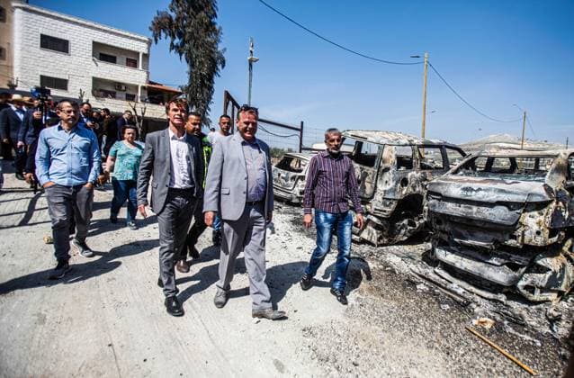 March 3, 2023, Nablus, West Bank, Palestine: Sven Kuhn von Burgsdorff, the European Union representative for the Palestinian Territories, center, survey the damage of a burnt cars in the West Bank town of Hawara which was set ablaze by radical Jewish settlers earlier this week . On Monday scores of Israeli settlers went on a violent rampage in the northern West Bank town of Hawara, setting cars and homes on fire after two settlers were killed by a Palestinian gunman. Nablus Palestine - ZUMAs197 20230303_zaa_s197_313 Copyright: xNasserxIshtayehx