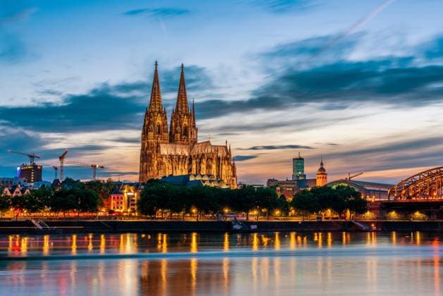Panoramic view of Cologne Cathedral with Hohenzollern Bridge at nightfall Panoramic view of Cologne Cathedral with Hohenzollern Bridge at nightfall, Germany. Copyright: xZoonar.com bernhardxklarx 17354034