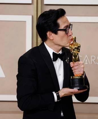Ke Huy Quan winner of the award for Best Supporting Actor, for ???Everything Everywhere All at Once??? appears backstage with her Oscar during the 95th annual Academy Awards at Loews Hollywood Hotel in the Hollywood section of Los Angeles on Sunday, March 12, 2023.  LAP20230312179 JOHNxANGELILLO