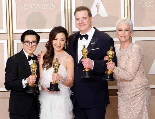 Brendan Fraser (second from R), winner of the award for Best Actor in a Leading Role for The Whale, and (L-R) Ke Huy Quan, winner of the award for Best Actor In A Supporting Role, Michelle Yeoh, winner of the award for Best Actress in a Leading Role and Jamie Lee Curtis, winner of the award for Best Supporting Actress for Everything Everywhere All at Once, appear backstage with their Oscars during the 95th annual Academy Awards at Loews Hollywood Hotel in the Hollywood section of Los Angeles on Sunday, March 12, 2023.  LAP20230312282 JOHNxANGELILLO