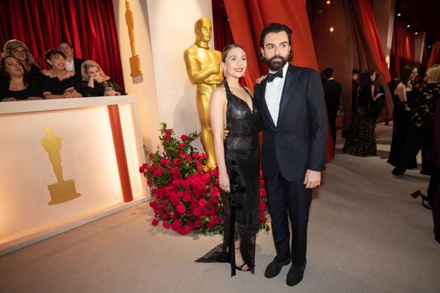 Elizabeth Olsen and Robbie Arnett arrive on the red carpet of The 95th OscarsÂ® at the DolbyÂ® Theatre at Ovation Hollywood on Sunday, March 12, 2023.  Copyright: xA.M.P.A.S.x 34494-388PLX