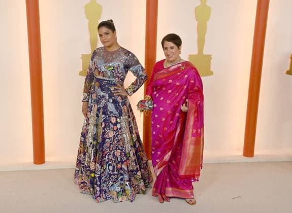 (L-R) Kartiki Gonsalves and Guneet Monga attend the 95th annual Academy Awards at the Dolby Theatre in the Hollywood section of Los Angeles on Sunday, March 12, 2023.  LAP2023031211296 JIMxRUYMEN